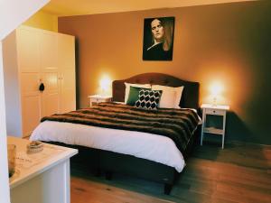 Un pat sau paturi într-o cameră la B&B Madoli