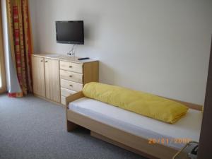 Postel nebo postele na pokoji v ubytování Ferienhaus Zillertal