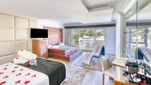 a hotel room with a bed and a television at Senator Marbella in Marbella
