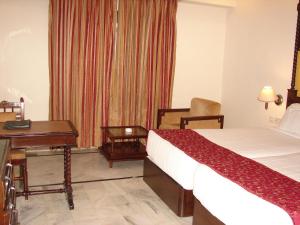 Ліжко або ліжка в номері Mansingh Palace, Ajmer