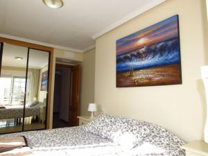Una cama o camas en una habitación de Torreon del Mar Apartment