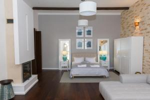 Ένα ή περισσότερα κρεβάτια σε δωμάτιο στο Cluj Lux Apartment Unirii
