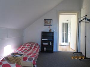 Postel nebo postele na pokoji v ubytování Herberge im "alten Pfarrhaus" in Schmergow am Havel-Radweg