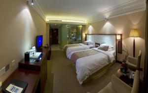 Letto o letti in una camera di Yun'an Huidu Hotel
