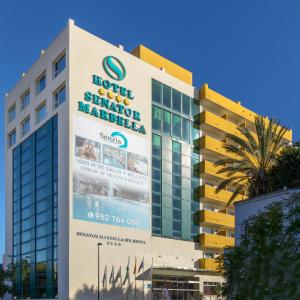 a building with a sign for the hotel shaver manilla at Senator Marbella Spa Hotel in Marbella