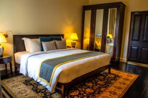 Voodi või voodid majutusasutuse Galle Face Hotel toas