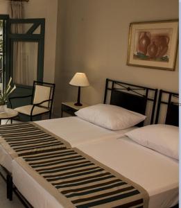 
Кровать или кровати в номере Solymar Naama Bay
