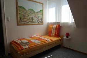 Ένα ή περισσότερα κρεβάτια σε δωμάτιο στο Lilis Ferienwohnung