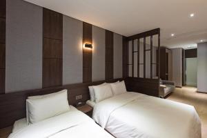Postel nebo postele na pokoji v ubytování Notte La Mia Hotel + 37 fotografií