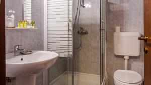 Koupelna v ubytování Hotel Herastrau