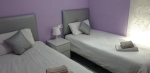 Posteľ alebo postele v izbe v ubytovaní Apartamento Omar Playa