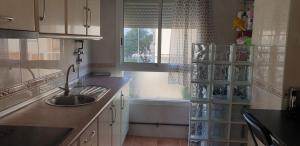 Kuchyňa alebo kuchynka v ubytovaní Apartamento Omar Playa
