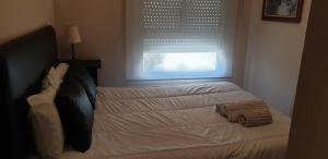 Posteľ alebo postele v izbe v ubytovaní Apartamento Omar Playa