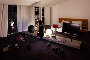 Televízia a/alebo spoločenská miestnosť v ubytovaní Hotel Ripa Roma