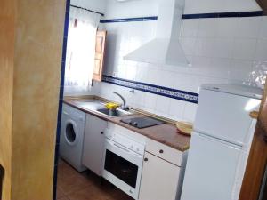 Una cocina o zona de cocina en Casa Joaquín - Apartamentos