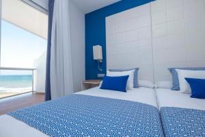 Posteľ alebo postele v izbe v ubytovaní Ibersol Torremolinos Beach