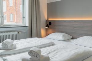 Letto o letti in una camera di Copenhagen Go Hotel