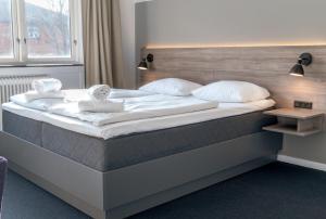 Letto o letti in una camera di Copenhagen Go Hotel