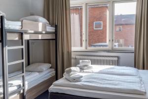 Letto o letti in una camera di Copenhagen Go Hotel
