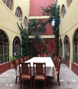 Restaurant ou autre lieu de restauration dans l'établissement Posada Don Giorgio