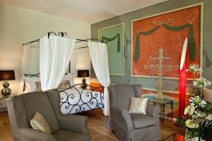 Posezení v ubytování Château De Siran - Hôtel & Spa