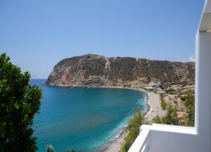 a view of a beach and the ocean at Agia Kyriaki Studios in Agia Kiriaki Beach