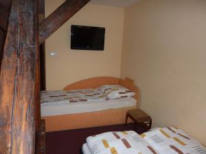 Letto o letti in una camera di Hotel Max Šimek