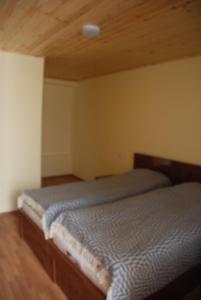Letto o letti in una camera di Gogi Jafaridze's Guesthouse