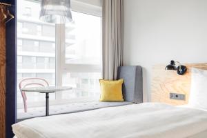 Кровать или кровати в номере Hotel Schani Wien