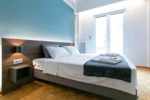Posteľ alebo postele v izbe v ubytovaní TONIS Le Petit Nicolas 1BD Apartment in Koukaki!