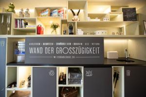 Kuchyň nebo kuchyňský kout v ubytování Lodge Hof Weissbad