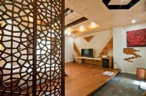A television and/or entertainment centre at ChunYang Homestay春陽一品居
