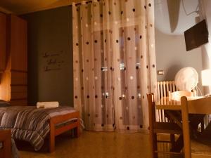 Posteľ alebo postele v izbe v ubytovaní B&B AMICI MIEI