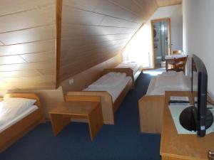 Säng eller sängar i ett rum på Landgasthof Zum Hirschen