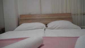 Posteľ alebo postele v izbe v ubytovaní Apartments Nera