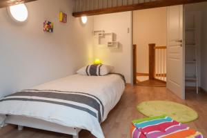Katil atau katil-katil dalam bilik di Maison Borrel