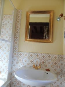 Koupelna v ubytování Chambres d'hôtes La Colinière + 13 fotografií