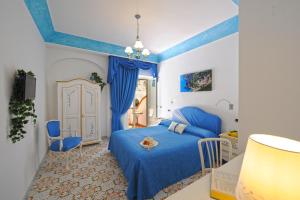 Postel nebo postele na pokoji v ubytování Hotel La Conchiglia