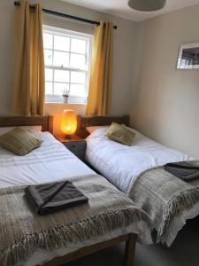 Кровать или кровати в номере Scafell View Apartment, Wasdale, Lake District, Cumbria