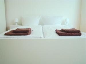Un ou plusieurs lits dans un hébergement de l'établissement BNB Potsdamer Platz - Rooms & Apartments
