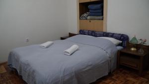 Posteľ alebo postele v izbe v ubytovaní Apartments Nera