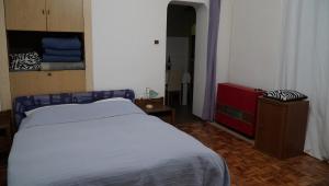 Posteľ alebo postele v izbe v ubytovaní Apartments Nera