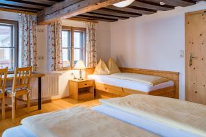 Postel nebo postele na pokoji v ubytování Kolping-Ferienhaus