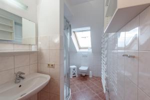 Koupelna v ubytování Kolping-Ferienhaus