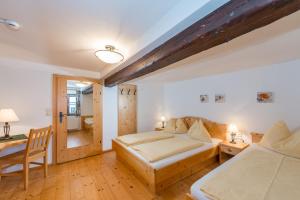 Postel nebo postele na pokoji v ubytování Kolping-Ferienhaus
