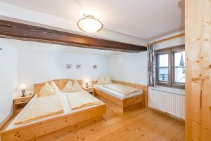 Postel nebo postele na pokoji v ubytování Kolping-Ferienhaus