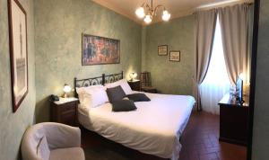 Postel nebo postele na pokoji v ubytování Bellavista Impruneta