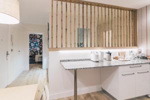 Kuchyň nebo kuchyňský kout v ubytování Urruti Apartment by People Rentals + 19 fotografií