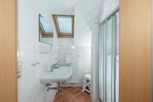 Koupelna v ubytování Kolping-Ferienhaus