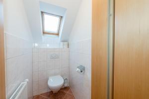 Koupelna v ubytování Kolping-Ferienhaus